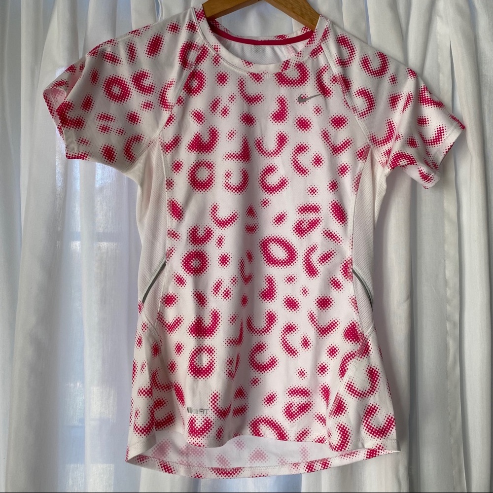 Pink and white nike running shirt